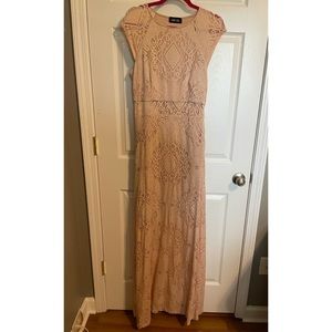 Long pale pink dress.